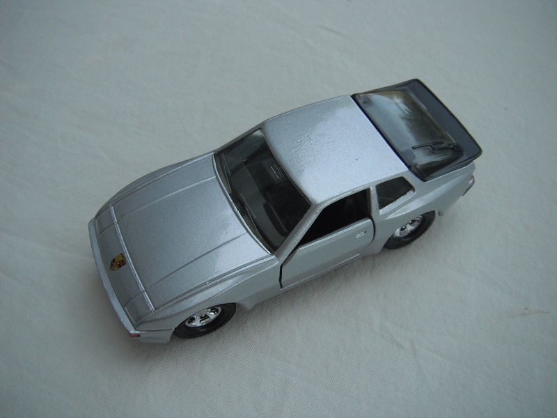 20.Silver body/black base/Macau/5SM whls/clear windows/lt.amber rear/black int/black steering/no tampo/PP.