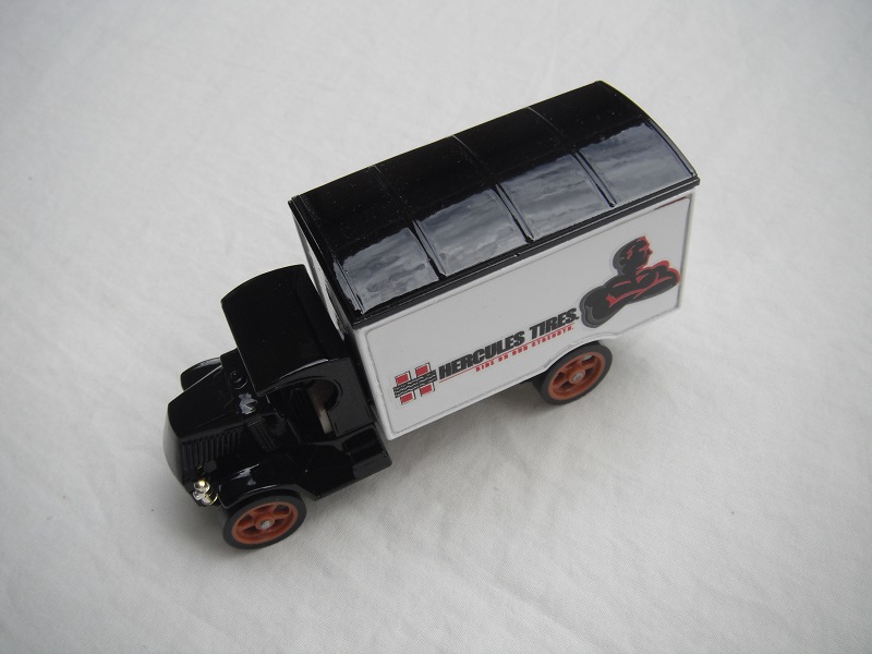 5. Black cab/black roof/white body/black base/Macau/brown wheels/light tan seat/long label.