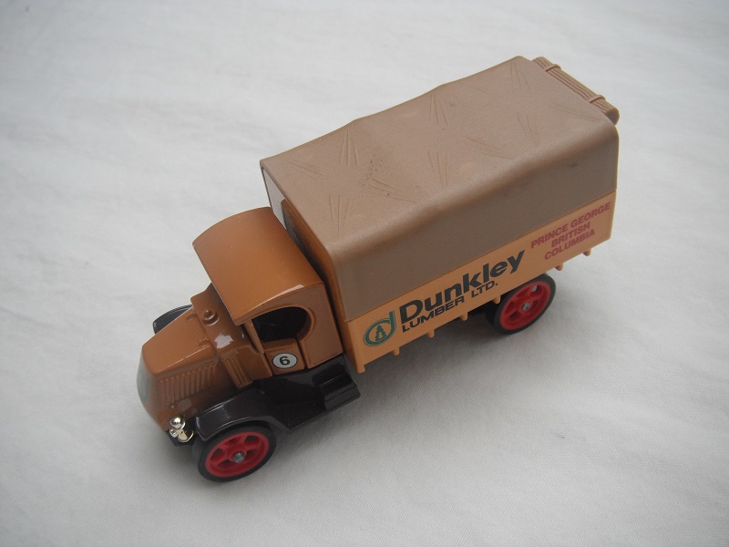 3. Mack Truck #6/Brown cab/fawn bed/tan canopy/brown base/England/red wheels.