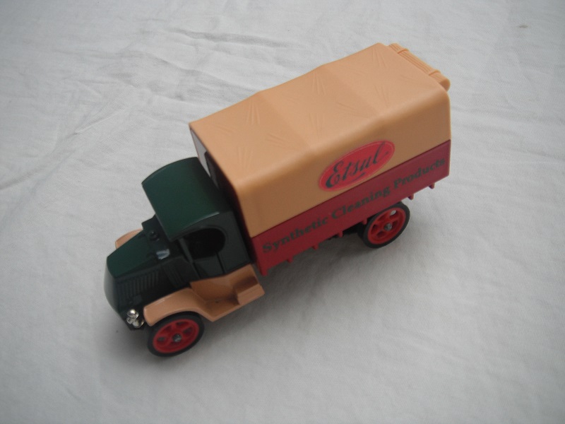 2. Dark green &amp; cream cab/red bed/sandy canopy/brown base/England/red wheels.