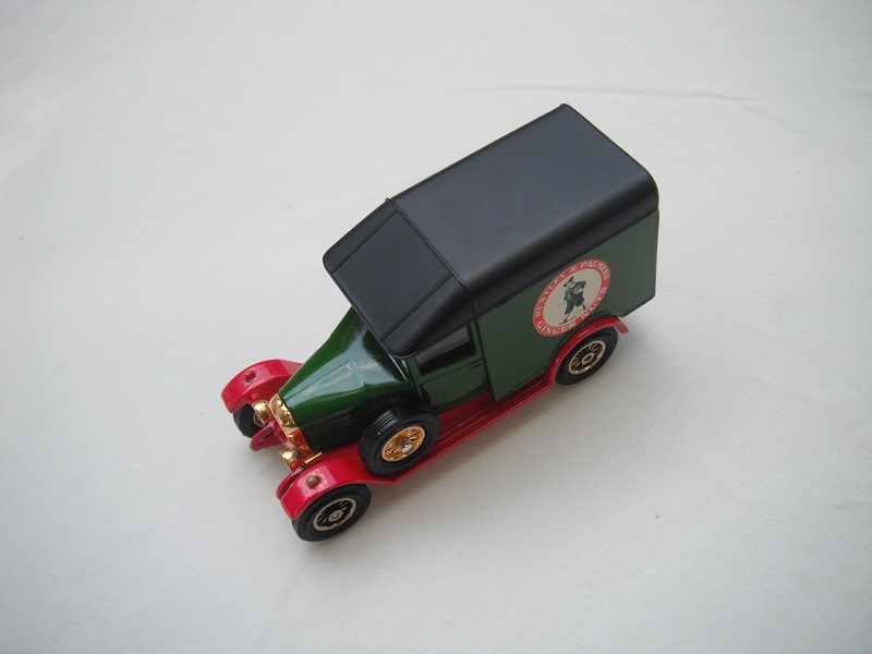 1. Green body/black roof/red base/China/YGB04 cast/12 spoke brass wheels.