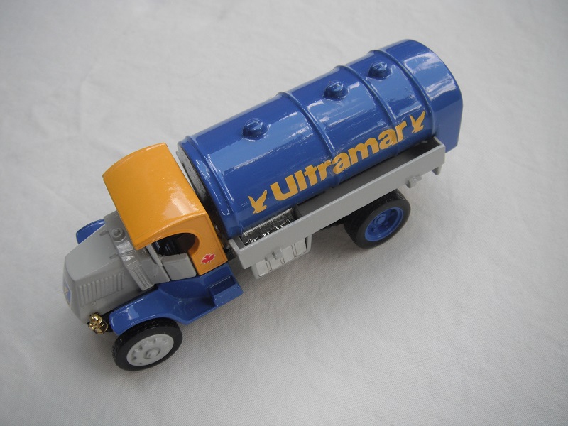 2. Mack Tanker/gray bonnet/yellow cab roof/blue chassis/blue tank/black base/China/Type 2 front wheels.