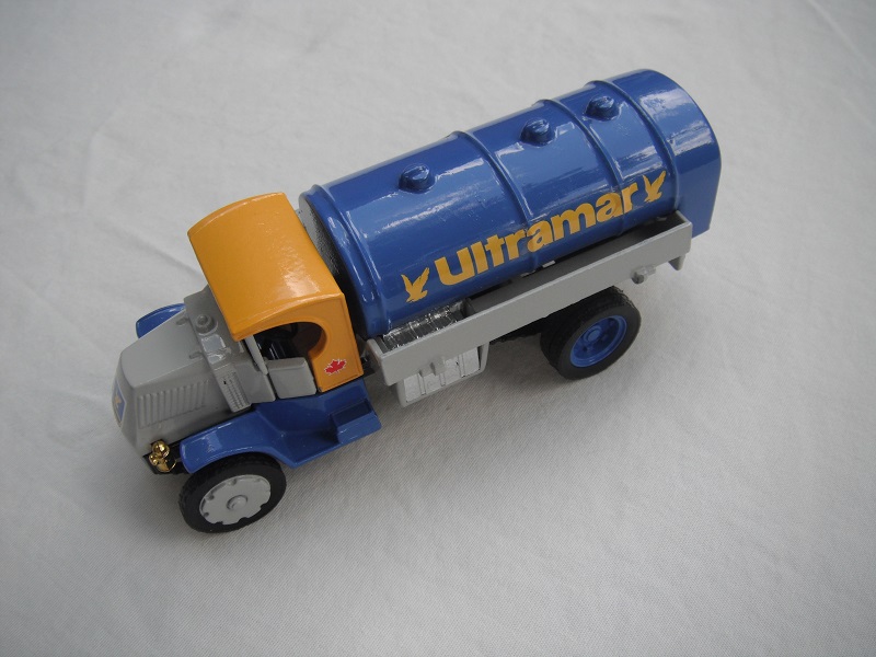 1. Mack Tanker/gray bonnet/yellow cab roof/blue chassis/blue tank/black base/Macau/Type 1 front wheels.