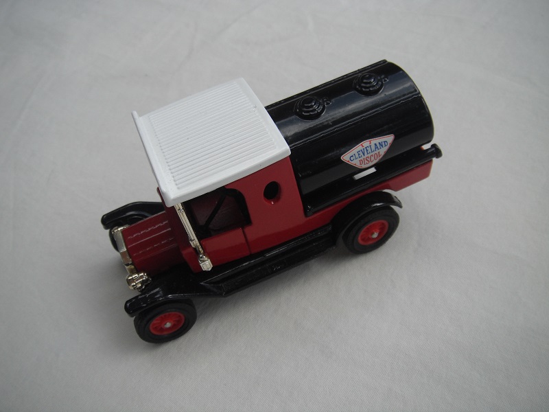 3. Model T Tanker/Red cab/white roof//black tank//black base/Macau/12 spoke red wheels.