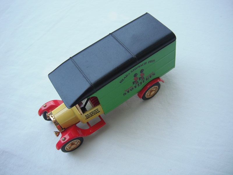 4. Ford Model TT Van/Yellow cab/green body/black roof/red base/China/12 spoke gold wheels/red seat.