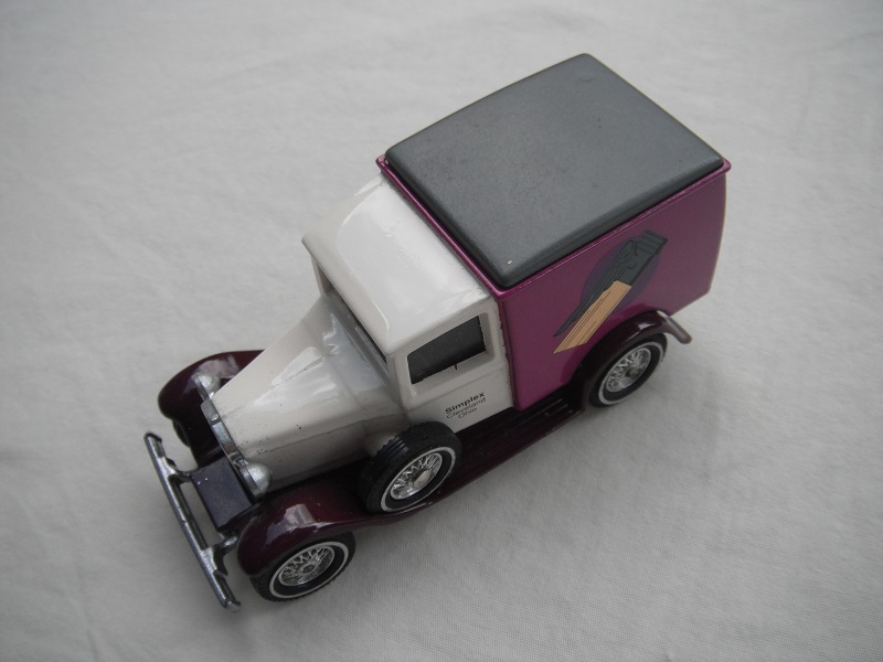 5. Model A van/White cab/purple body/gray roof/purple base/China/12 spoke chrome WW wheels/maroon seat.