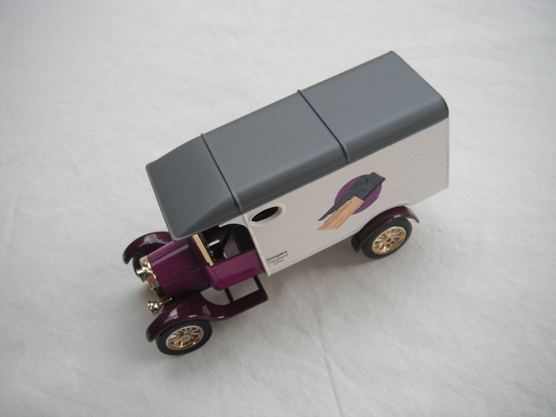 3. Model TT van/Purple cab/white body/gray roof with underside lug/purple base/China/12 spoke gold wheels/black seat.