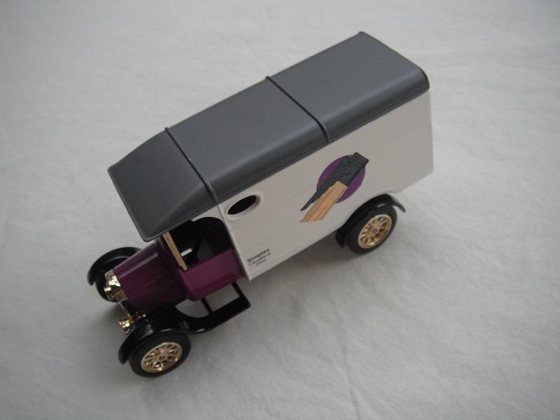 1. Model TT van/Purple cab/white body/gray roof without underside lug/black base/China/12 spoke gold wheels/gray seat.