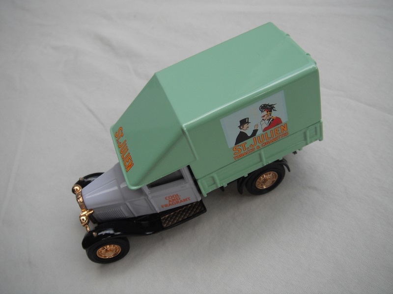 5. Ford Model 'AA' Truck/Lilac cab/sea green body/no header board/black base/China/gold wheels.