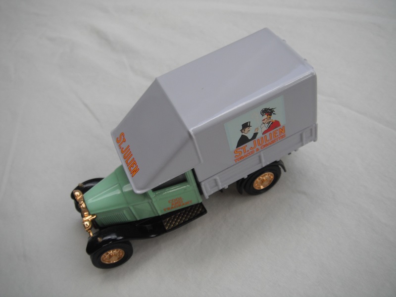 3. Ford Model 'AA' Truck/Sea green cab/pale lilac body/no header board/black base/China/gold wheels.