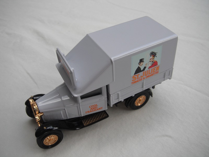 1. Ford Model 'AA' Truck/Pale lilac  body/w/header board/black base/YWG06 China/gold wheels.