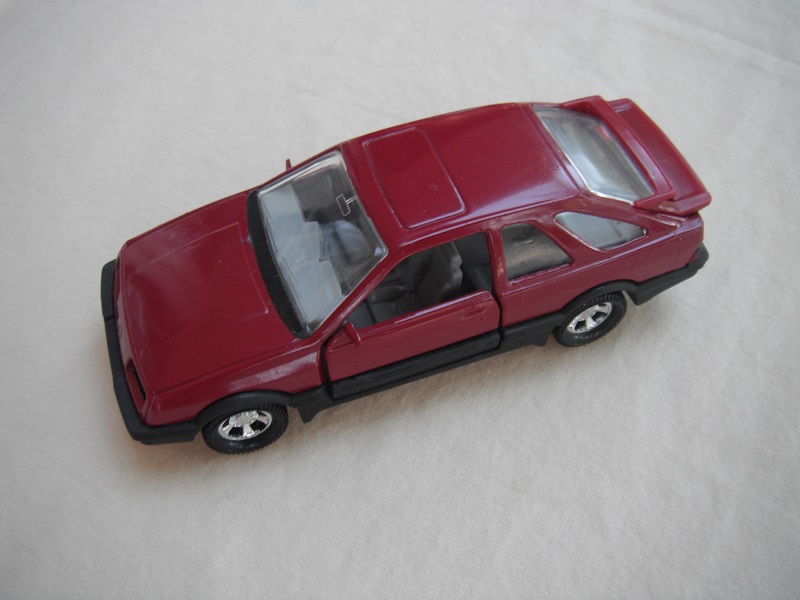 20. Plum body &amp; spoiler/black England base/5 spoke mag wheels/clear windows/gray int/black steering wheel.