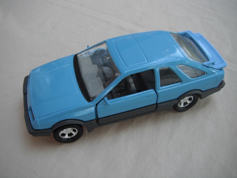 19. Lt.blue body &amp; spoiler/gray England base/5 spoke mag wheels/clear windows/gray int/black steering wheel.