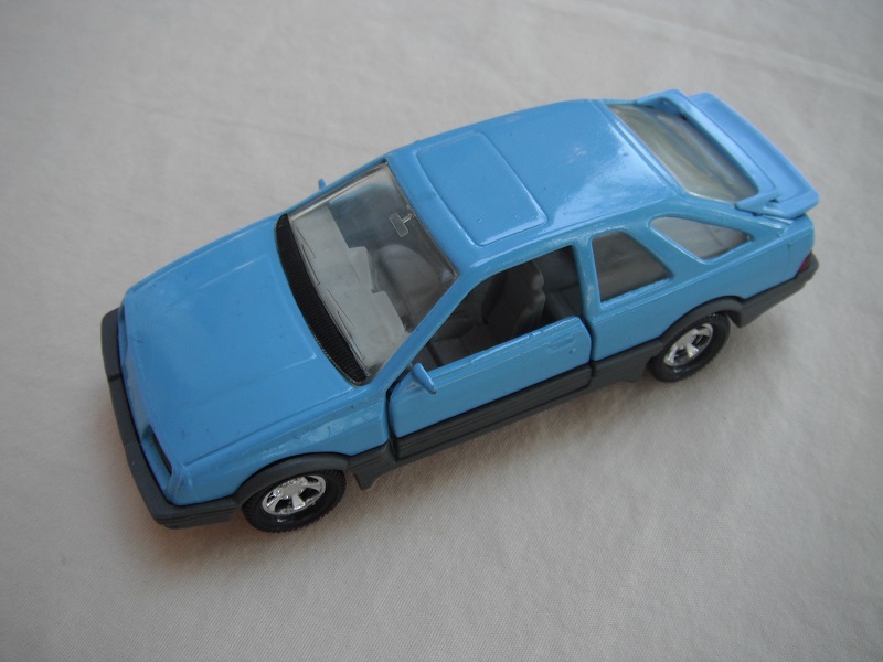 17. Lt.blue body &amp; spoiler/gray England base/5 spoke mag wheels/clear windows/lt.gray int/black steering wheel.