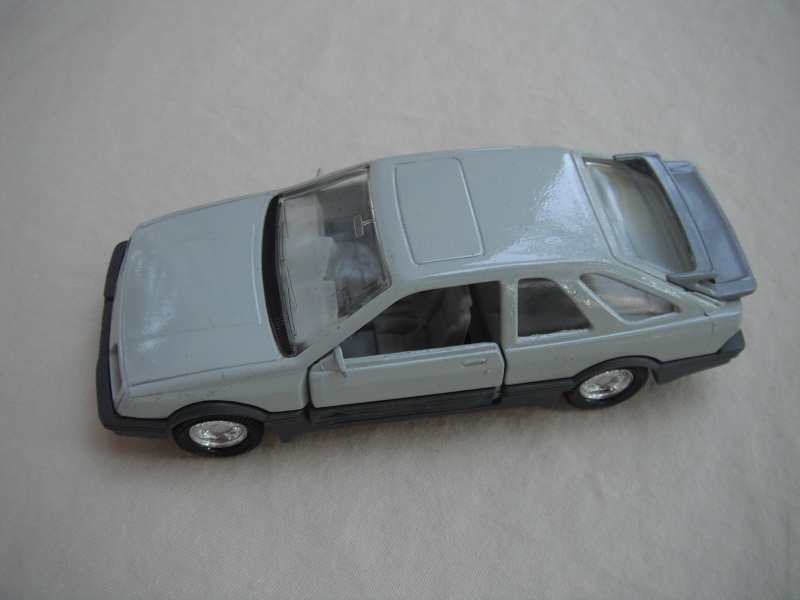 4. Gray body &amp; spoiler/black England base/8 dot chrome disc wheels/clear windows/gray int/black steering wheel/PP.