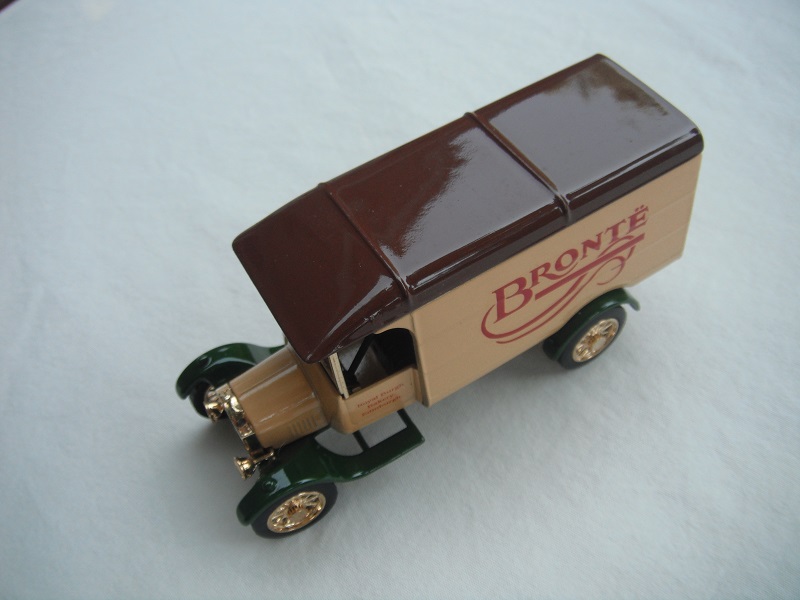 4. Model 'TT' van/Cream body/brown roof/green base/12 spoke gold wheels.