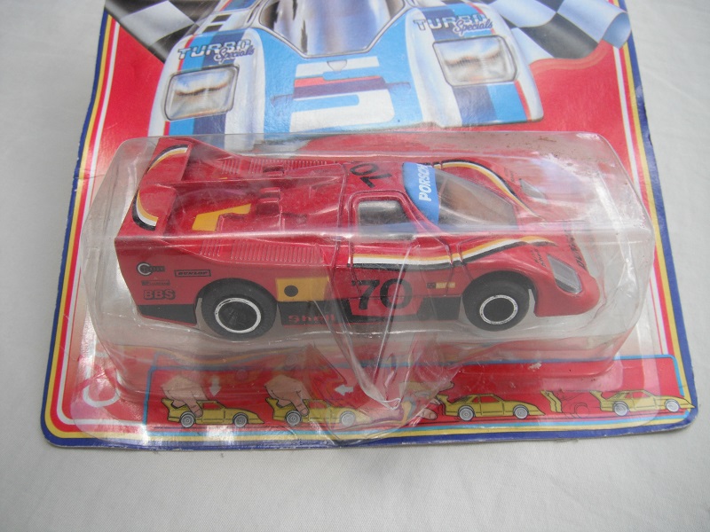 20.Red body/black base/China/clear windows/brown interior/unchromed wheels/pullback motor//Porsche Dunlop #70.