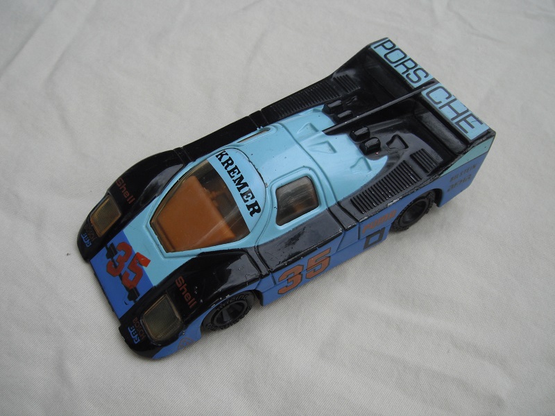 17.Black, light &amp; dark blue body/black base/China/lt.amber windows/brown interior/unchromed wheels/Porsche Kremer #35.