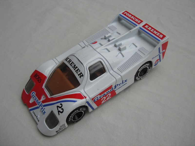 10.White &amp; red body/black base/Macau/clear windows/brown interior/chromed lettering on wheels/Kremer Grand-Prix #22.