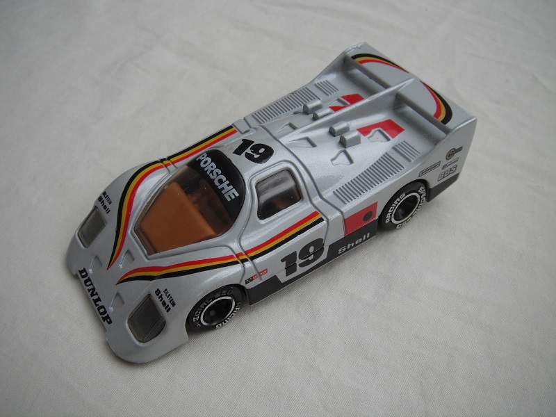 9. Silver body/black base Macau/clear windows/dark brown interior/chromed lettering on wheels/Porsche #19.