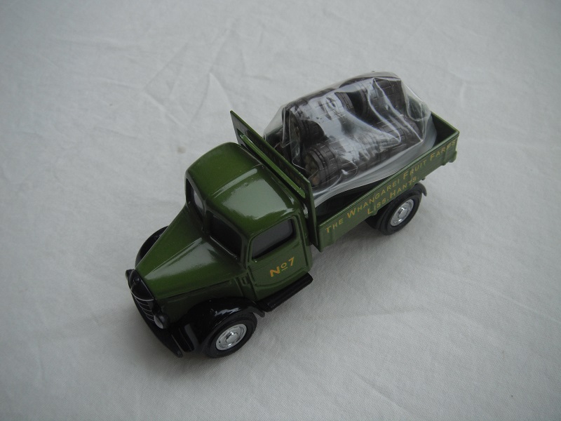 3.  Light green cab &amp; bed/black base/Y63 China/with load of apples/No.7.