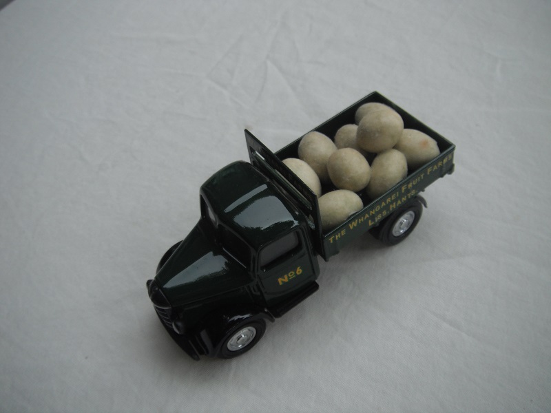 2.  Dark green cab &amp; bed/black base/ Y63 China/load of melons/No.6.