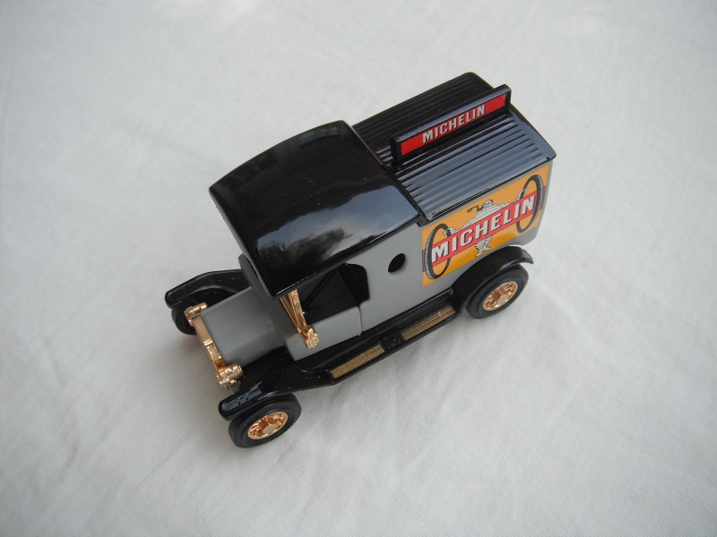 5, Model 'T' van/gray body/black roof/black base/China/12 spoke chrome wheels/blue seat.