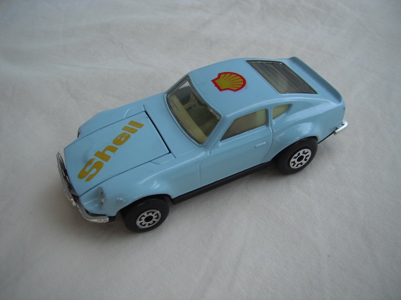 B161. Lt.blue body/gloss black base/yellow interior/5 arch front, 5 crown rear wheels/ &quot;shell&quot; on hood &amp; shell logo on roof.