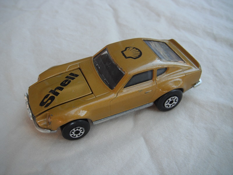 B160. Gold body/silver base/black interior/5 arch front, 5 crown rear wheels/ &quot;shell&quot; on hood &amp; shell logo on roof.