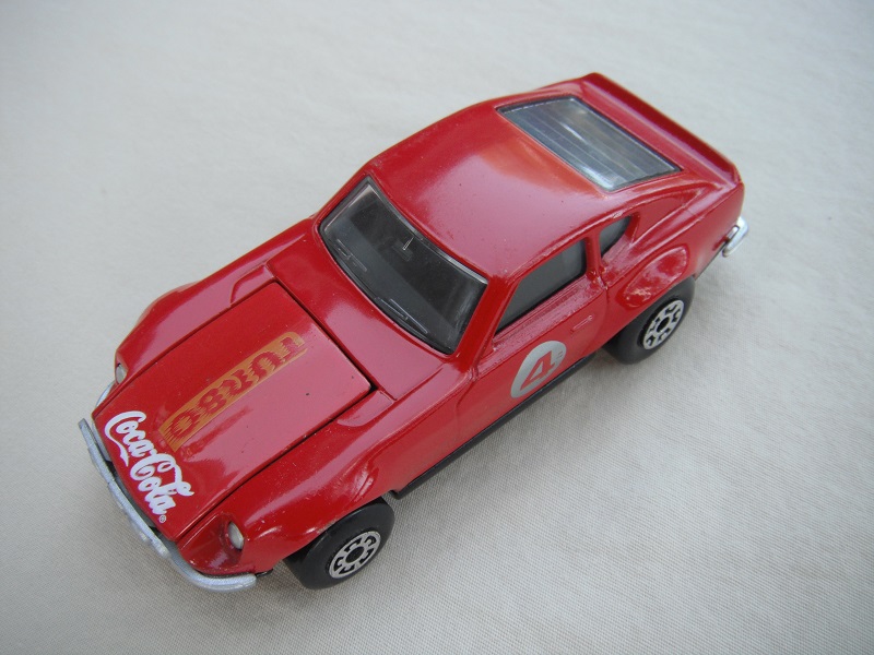 B142. Dk.red body/black base/black interior/5 arch front, 5 crown rear wheels/&quot;4&quot; on door &amp; Coca Cola on hood.