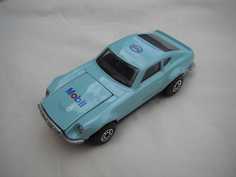 B85. Light blue body/charcoal base/black interior/5 arch front, 5 crown rear wheels/Mobil &amp; Esso decals.