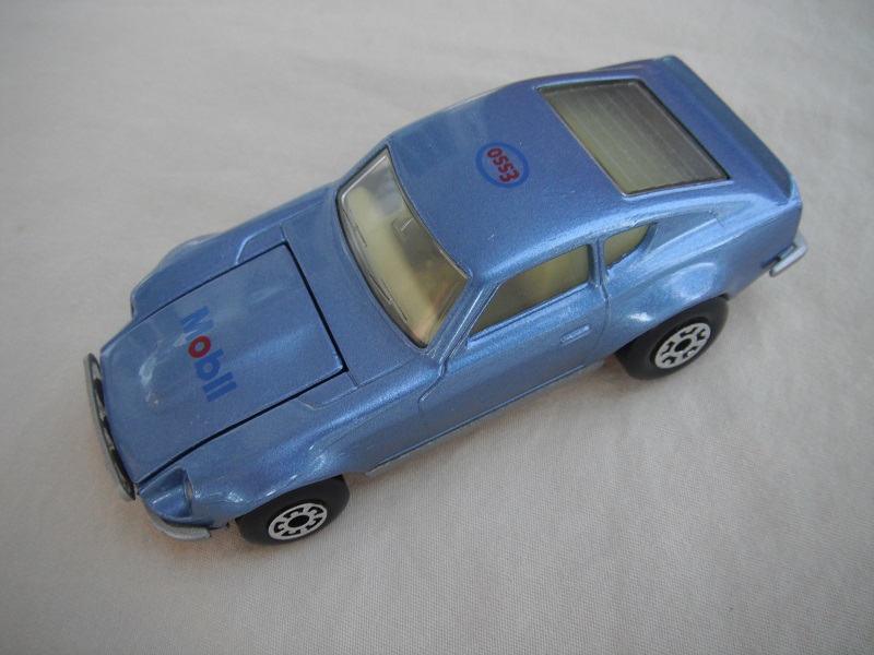 B83. Metallic blue body/silver base/light yellow interior/5 arch front, 5 crown rear wheels/Mobil &amp; Esso decals.