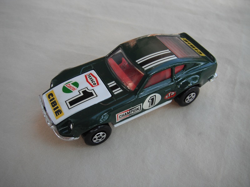 E13.Dk.green body/white hood/white base w/hole/dk.red interior/5 spoke whls/&quot;1 Cibie&quot; decals on hood &amp; sides, stripes on roof/Speedkings.