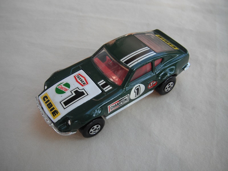 E12.Dk.green body/white hood/wht base w/hole/red interior/5 spoke whls/&quot;1 Cibie&quot; decals on hood &amp; sides, stripes on roof/Superkings.