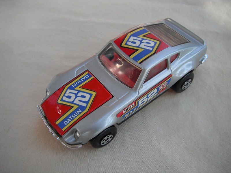 E6. Silver body/red hood/gloss black base/red interior/5 spoke wheels/&quot;52 Datsun&quot; labels on hood, red on roof &amp; sides/Speedkings.