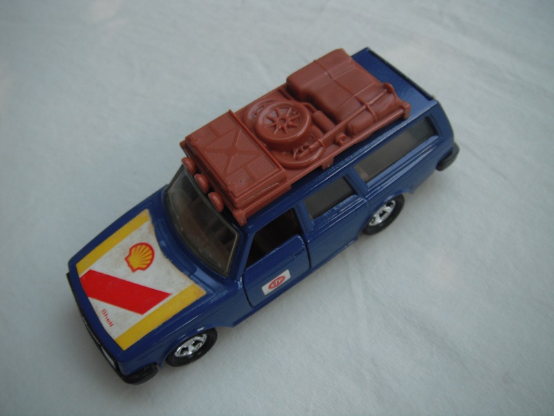 16.Blue body/black base/Matchbox England/Superkings/5SMW/clear windows/no chrome outline/orange int/lt.brown roof luggage rack/Champion &amp; Shell labels.