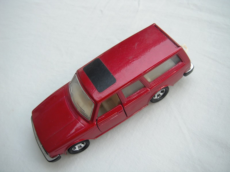 9. Met.dark red body/black base/Lesney England/Superkings/5SMW/clear windows/chrome outline/cream interior/black roof label.