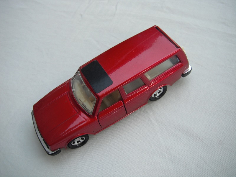 8. Met.red body/black base/Lesney England/Superkings/5SMW/clear windows/chrome outline/cream interior/black roof label.