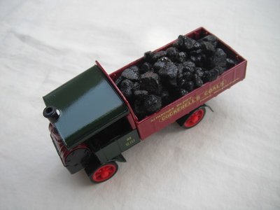 5. Yorkshire Steam Wagon/Dark green cab/dark green bed/black base/Macau/red wheels/load of coal.