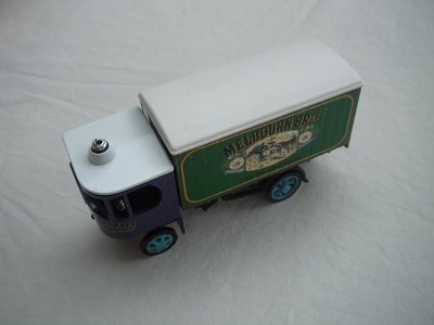 5. Garrett Steam Wagon/purple cab/green body/white roof/dk.blue chassis/dk.blue base/Y27/Macau/lt.blue Y spoke wheels.