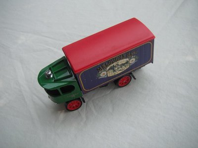 4. Atkinson Steam Wagon/green cab/purple body/red roof/black chassis/black base/YGB03/China/red 8 spoke wheels.