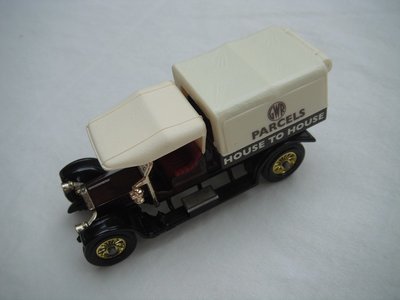 4. Crossley Truck/brown body/cream canopy/black base/England/12 spoke brass wheels/burgundy seat/&quot;Parcels&quot;.