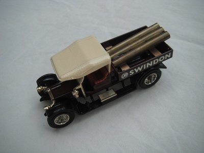 2. Crossley Truck/brown body/cream canopy/black base/England/12 spoke gold wheels/brown seat/brass pipes for load.