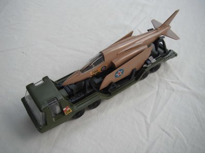 5. Olv grn body/flat blk K13-2/K-114 base/dk.brn xle cvrs/clr wind/lt.gry int &amp; hdlts/&quot;219&quot; label/tan plane/clr cockpit/wht ammo.