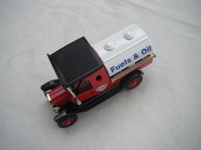 3.  Model &quot;T&quot; Tanker/Red cab/black roof/white tank/black base/Lesney England/12 spoke red wheels/black seat.