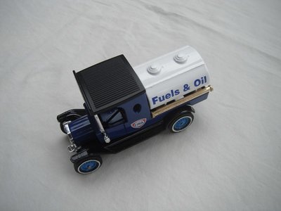 1.  Model &quot;T&quot; Tanker/Blue cab/black roof/white tank/black base/Lesney England/24 spoke blue wheels/pinky-tan seat.