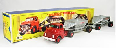 M4-2 Fruehauf Hopper Train. Dark red cab, unplated pivot boss, large tow pin, cast ridge on hoppers, large F label..JPG