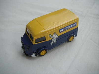 1.  Blue bonnet/yellow &amp; blue body/yellow roof/black base/China/yellow wheels/Michelin figure on bumper.