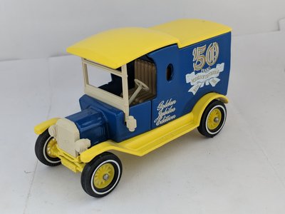 Blue and yellow, with ivory plastic parts (25).