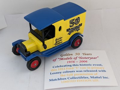 Yellow and blue, with black plastic parts (25).